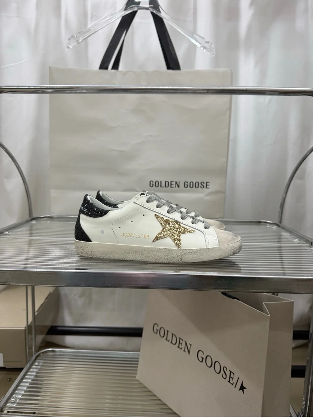 Golden Goose White Leather Sneakers with Gold Glitter Star and Black Heel Accent